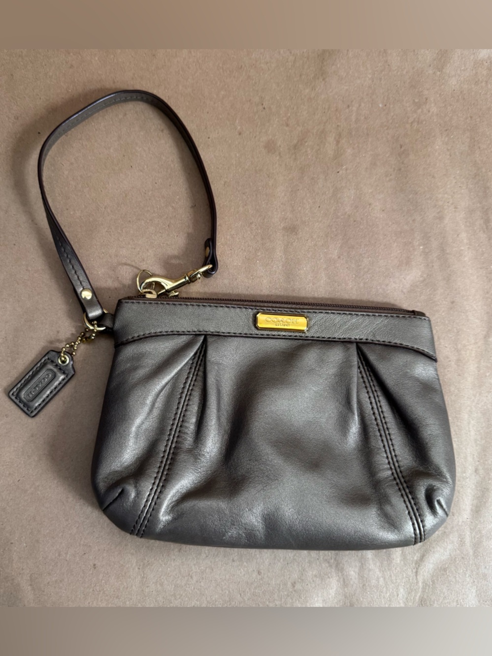 Coach Vintage Legacy Wristlet in Metallic Bronze Leather. 7.5" by 5"